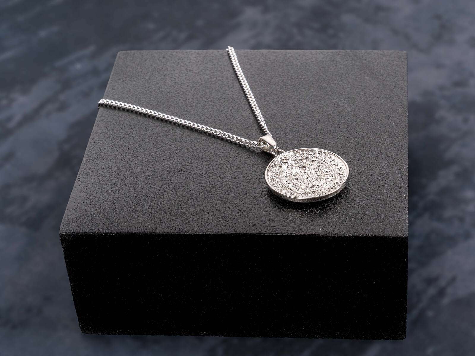 silver lost token pendant