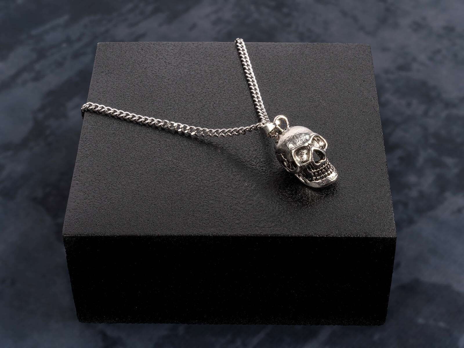 silver skull pendant