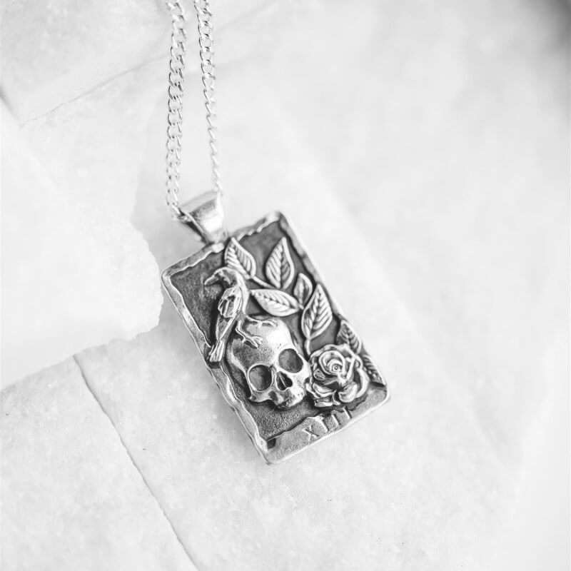 silver skull leaf pendant