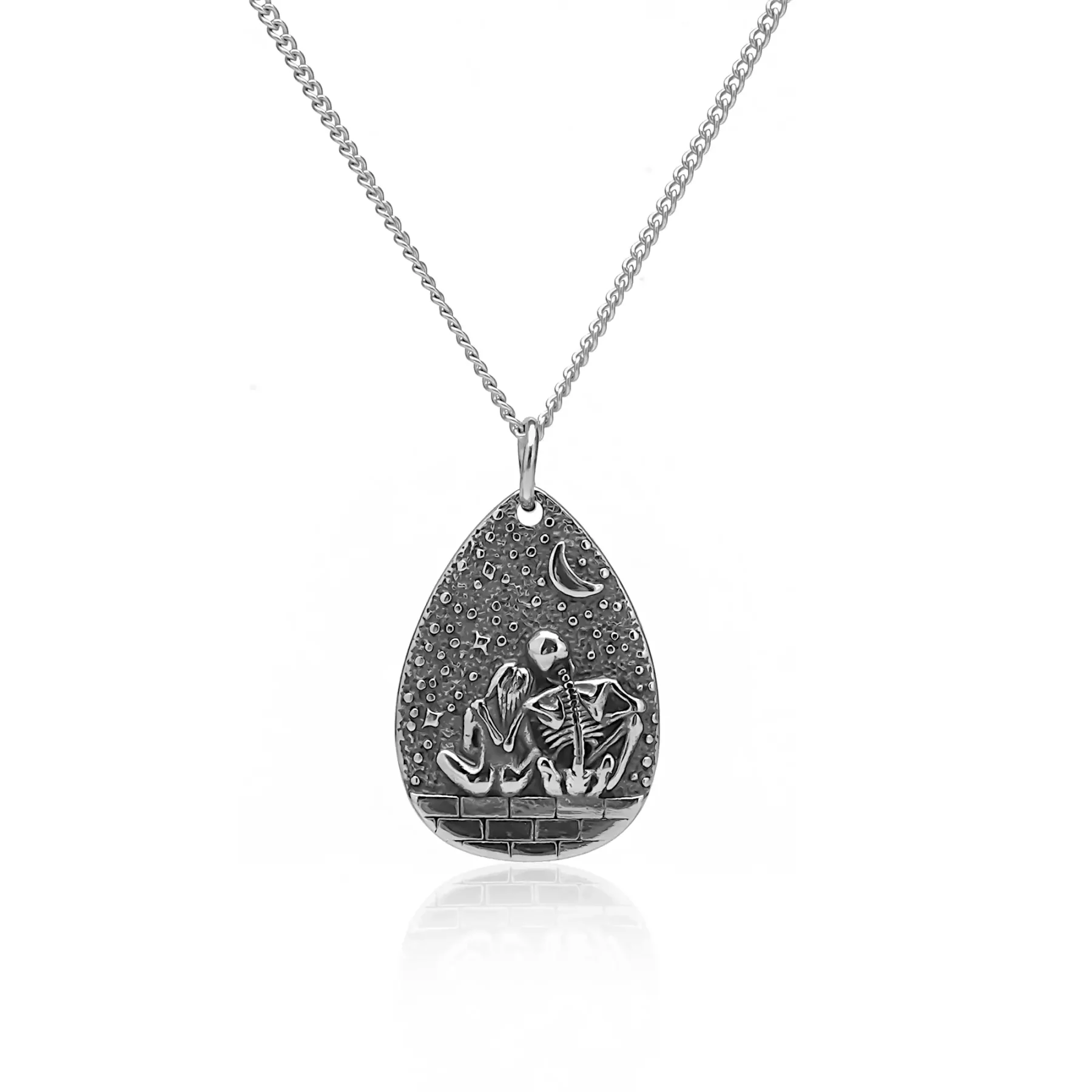 silver skeleton pendant